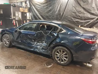 2018 Mazda Mazda6 Sport with VIN JM1GL1UMXJ1330989, listed as a IAAI auction lot 41355353 with 52,869 mi miles. Bid and sale history available at carsss.com. Image 6.