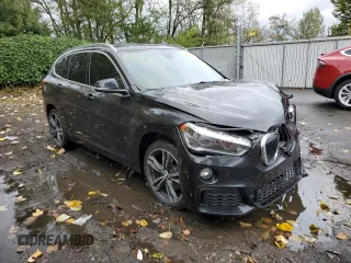 2016 BMW X1 xDrive28i with VIN WBXHT3C34G5F64464, listed as a Copart auction lot 65818472 with 74,385 mi miles. Bid and sale history available at carsss.com. Image 1.