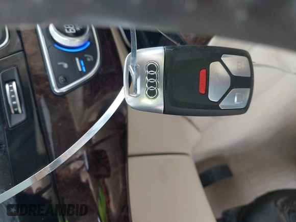 2019 Audi Q7 Premium Plus z VIN WA1LAAF71KD031123, wystawiony jako IAAI lot #41953574 z przebiegiem 48 999 mil mil oraz . Historia ofert i sprzedaży dostępna na DreamBid. Obrazek 11.