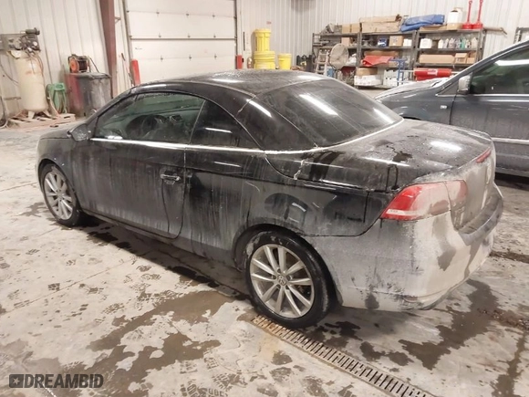 2012 Volkswagen Eos Komfort with VIN WVWBW7AH1CV004778, listed as a IAAI auction lot 41605147 with NaN miles. Bid and sale history available at carsss.com. Image 3.