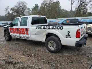 2011 Ford Super Duty F-250 SRW XL with VIN 1FT7W2AT1BEA30812, listed as a Copart auction lot 80519864 with 155,651 mi miles and Salvage Title. Bid and sale history available at carsss.com. Image 2.