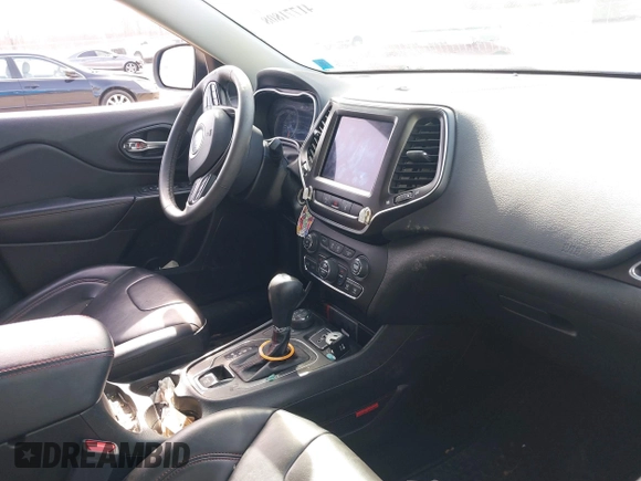 2021 Jeep Cherokee Trailhawk with VIN 1C4PJMBX4MD222987, listed as a IAAI auction lot 41771808 with 52,533 mi miles and . Bid and sale history available at DreamBid. Image 5.