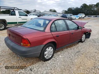 1999 Saturn SL with VIN 1G8ZH5288XZ201788, listed as a Copart auction lot 88923435 with 196,148 mi miles and Salvage Title. Bid and sale history available at carsss.com. Image 3.