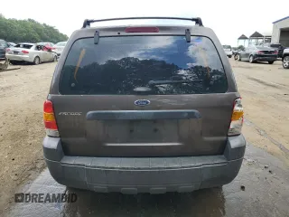 2006 Ford Escape XLS with VIN 1FMYU02Z56KD47674, listed as a Copart auction lot 60668134 with 248,535 mi miles and Salvage Title. Bid and sale history available at carsss.com. Image 6.