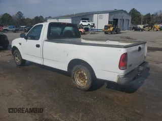 2003 Ford F-150 XL with VIN 1FTRF17W33NA54471, listed as a Copart auction lot 42594765 with 134,409 mi miles and Salvage Title. Bid and sale history available at DreamBid. Image 2.