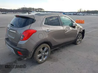 2014 Buick Encore Leather with VIN KL4CJCSB3EB739931, listed as a IAAI auction lot 41891726 with 113,473 mi miles and . Bid and sale history available at carsss.com. Image 4.