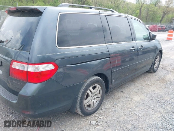 2005 Honda Odyssey EX with VIN 5FNRL38495B004614, listed as a IAAI auction lot 42128185 with 230,247 mi miles. Bid and sale history available at carsss.com. Image 4.