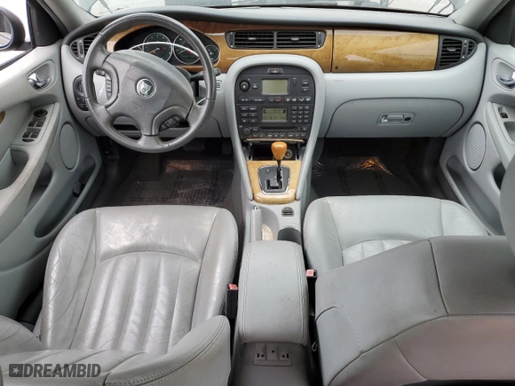 2002 Jaguar X-Type with VIN SAJEA51C02WC46124, listed as a Copart auction lot 50656395 with 50,815 mi miles and Salvage Title. Bid and sale history available at carsss.com. Image 8.