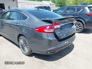 2017 Ford Fusion Titanium с VIN 3FA6P0K99HR136596, выставлен на аукционе IAAI как лот 42347238 с пробегом 149 749 миль миль и . История ставок и продаж доступна на DreamBid. Изображение 6.