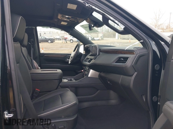 2024 Chevrolet Suburban Premier with VIN 1GNSKFKT7RR352859, listed as a IAAI auction lot 41814407 with 5,234 mi miles and . Bid and sale history available at DreamBid. Image 5.