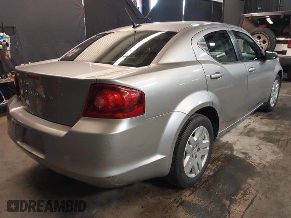 2014 Dodge Avenger SE with VIN 1C3CDZAB5EN228953, listed as a IAAI auction lot 41898027 with 33,731 mi miles. Bid and sale history available at carsss.com. Image 4.