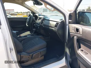 2021 Ford Ranger XL z VIN 1FTER4EH5MLE05003, wystawiony jako IAAI lot #42649042 z przebiegiem 62 571 mil mil oraz . Historia ofert i sprzedaży dostępna na DreamBid. Obrazek 5.