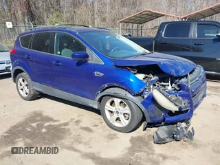 2013 Ford Escape SE with VIN 1FMCU9GX5DUB20394, listed as a IAAI auction lot 41889989 with 121,417 mi miles. Bid and sale history available at carsss.com. Image 1.