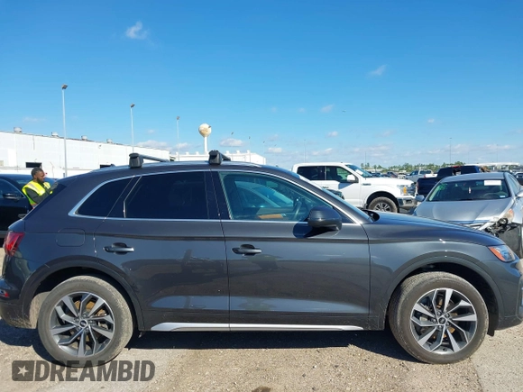2021 Audi Q5 Premium Plus z VIN WA1BAAFY6M2013249, wystawiony jako IAAI lot #38681569 z przebiegiem 68 694 mil mil oraz . Historia ofert i sprzedaży dostępna na DreamBid. Obrazek 13.