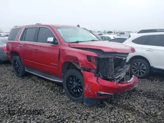 2015 Chevrolet Tahoe LTZ z VIN 1GNSKCKC6FR276531, wystawiony jako IAAI lot #41692617 z przebiegiem 124 010 mil mil oraz . Historia ofert i sprzedaży dostępna na DreamBid. Obrazek 1.