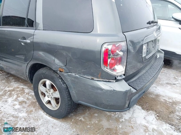 2007 Honda Pilot EX with VIN 2HKYF18427H513083, listed as a IAAI auction lot 41376346 with 301,841 mi miles. Bid and sale history available at carsss.com. Image 6.
