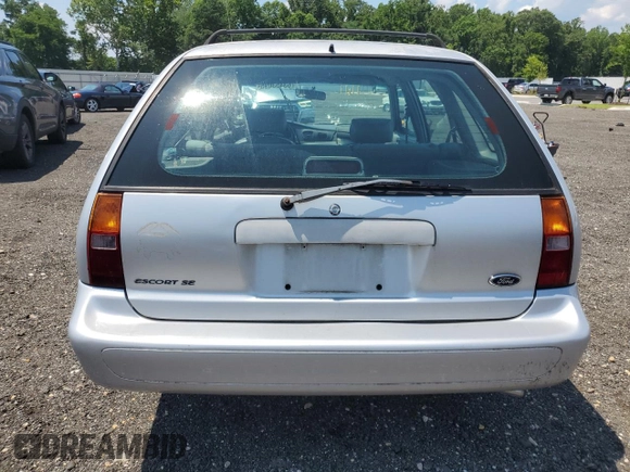 1998 Ford Escort SE with VIN 3FAFP15P4WR240362, listed as a Copart auction lot 63453095 with 220,855 mi miles and Salvage title. Bid and sale history available at DreamBid. Image 6.