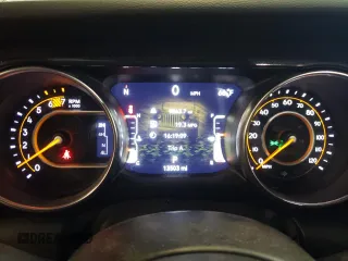 2023 Jeep Wrangler Sport Altitude with VIN 1C4HJXDG0PW679789, listed as a Copart auction lot 65991094 with 13,503 mi miles and Salvage Title. Bid and sale history available at DreamBid. Image 9.