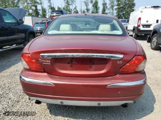 2006 Jaguar X-Type with VIN SAJWA51A16WE85139, listed as a Copart auction lot 66423084 with 137,318 mi miles and Salvage Title. Bid and sale history available at carsss.com. Image 6.