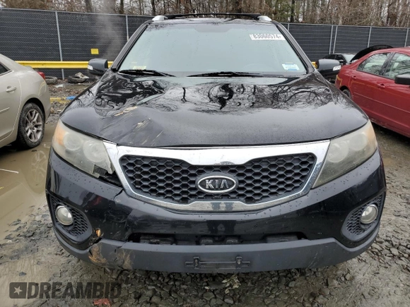 2012 Kia Sorento LX with VIN 5XYKT4A29CG196963, listed as a Copart auction lot 83060574 with 246,500 mi miles and Salvage Title. Bid and sale history available at carsss.com. Image 5.