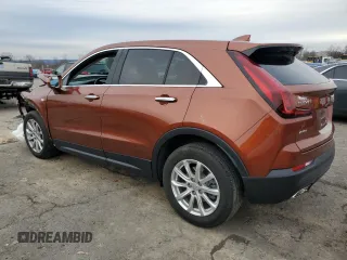 2019 Cadillac XT4 AWD Luxury with VIN 1GYFZBR42KF157525, listed as a Copart auction lot 85779424 with 19,982 mi miles and Salvage Title. Bid and sale history available at carsss.com. Image 2.