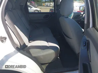 2007 Ford Escape XLT with VIN 1FMYU03127KC05177, listed as a IAAI auction lot 42199281 with 144,846 mi miles and . Bid and sale history available at DreamBid. Image 8.