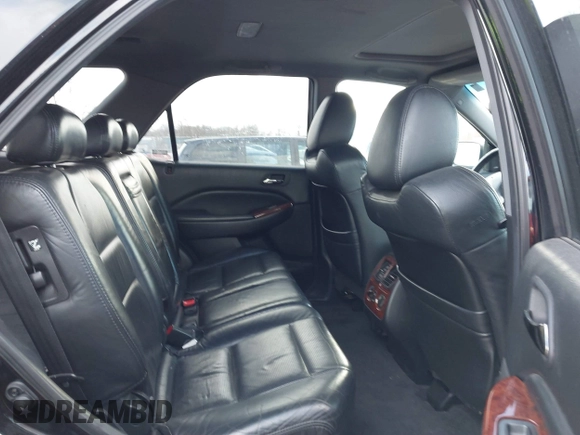 2004 Acura MDX Touring Pkg w/Navigation with VIN 2HNYD18864H519475, listed as a IAAI auction lot 41450182 with 203,389 mi miles. Bid and sale history available at carsss.com. Image 8.