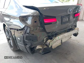 2021 BMW 5 Series 530e with VIN WBA13AG04MCF36168, listed as a IAAI auction lot 42256325 with 71,211 mi miles and . Bid and sale history available at DreamBid. Image 6.