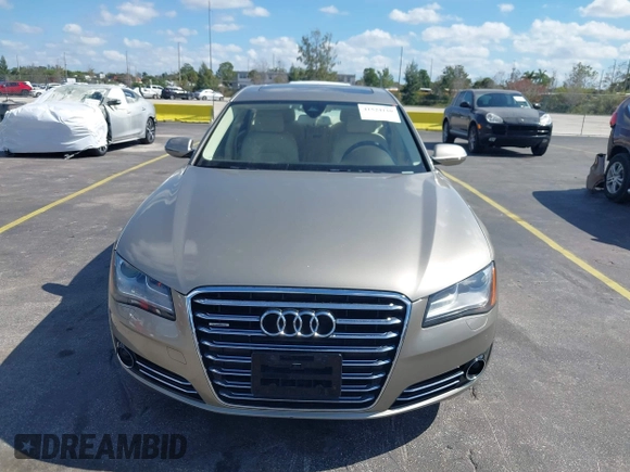 2012 Audi A8 z VIN WAURVAFD0CN001646, wystawiony jako IAAI lot #41524110 z przebiegiem 105 187 mil mil oraz . Historia ofert i sprzedaży dostępna na DreamBid. Obrazek 6.