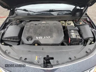 2014 Chevrolet Impala LT z VIN 2G1125S32E9295577, wystawiony jako Copart lot #86899044 z przebiegiem 169 297 mil mil oraz Szkoda całkowita • Salvage title. Historia ofert i sprzedaży dostępna na DreamBid. Obrazek 11.