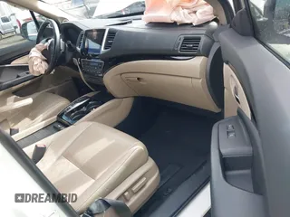 2016 Honda Pilot Elite with VIN 5FNYF6H05GB062868, listed as a IAAI auction lot 41804794 with 1 mi miles. Bid and sale history available at carsss.com. Image 5.