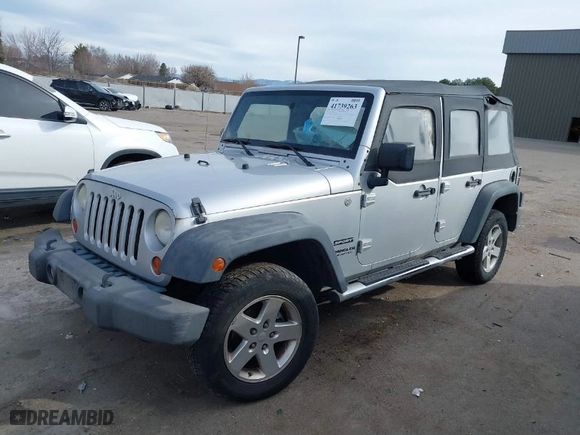 2010 Jeep Wrangler Unlimited Sport with VIN 1J4BA3H10AL112599, listed as a IAAI auction lot 41739263 with 156,301 mi miles. Bid and sale history available at carsss.com. Image 2.