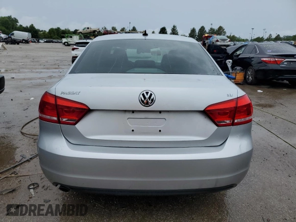 2012 Volkswagen Passat SE z VIN 1VWBH7A39CC027054, wystawiony jako Copart lot #62411324 z przebiegiem 93 729 mil mil oraz Szkoda całkowita • Salvage title. Historia ofert i sprzedaży dostępna na DreamBid. Obrazek 6.