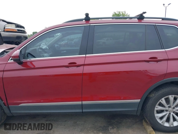 2018 Volkswagen Tiguan SEL with VIN 3VV3B7AXXJM086672, listed as a IAAI auction lot 42006533 with 90,511 mi miles and . Bid and sale history available at DreamBid. Image 14.