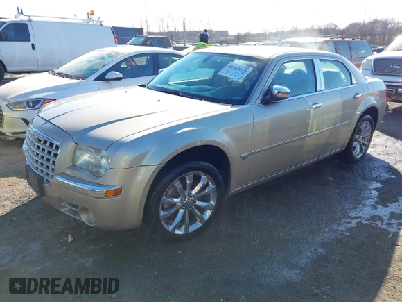 2006 Chrysler 300 C with VIN 2C3KK63H66H374760, listed as a IAAI auction lot 41365655 with 186,900 mi miles. Bid and sale history available at carsss.com. Image 2.
