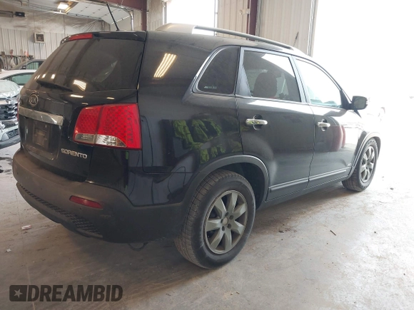 2011 Kia Sorento LX with VIN 5XYKTCA1XBG026949, listed as a IAAI auction lot 42398917 with 185,193 mi miles and . Bid and sale history available at DreamBid. Image 4.