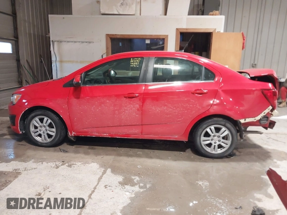 2014 Chevrolet Sonic LT with VIN 1G1JC5SH2E4214489, listed as a IAAI auction lot 41650289 with 93,388 mi miles and . Bid and sale history available at DreamBid. Image 14.