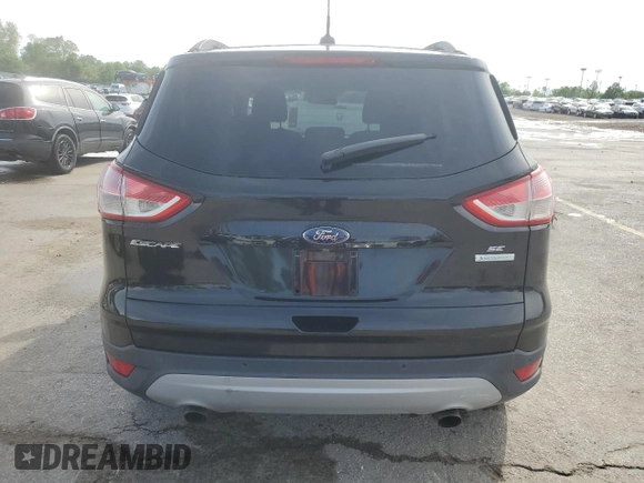 2015 Ford Escape SE with VIN 1FMCU0GX2FUC11718, listed as a Copart auction lot 55312865 with 130,298 mi miles and Clean Title. Bid and sale history available at DreamBid. Image 6.