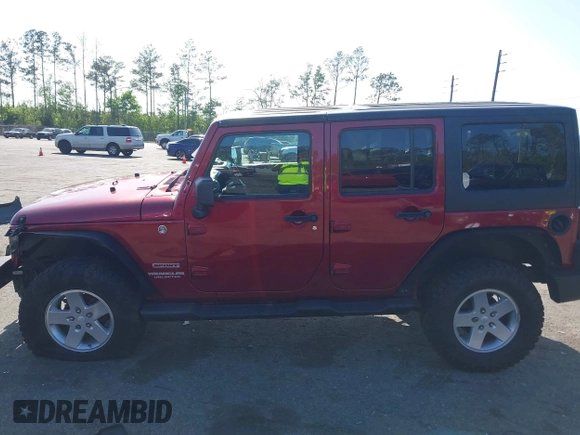 2011 Jeep Wrangler Unlimited Sport with VIN 1J4BA3H18BL598323, listed as a IAAI auction lot 41958043 with 154,354 mi miles. Bid and sale history available at carsss.com. Image 14.