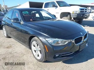 2016 BMW 3 Series 328i xDrive with VIN WBA8E3G51GNT80323, listed as a IAAI auction lot 41862348 with 136,531 mi miles. Bid and sale history available at carsss.com. Image 1.