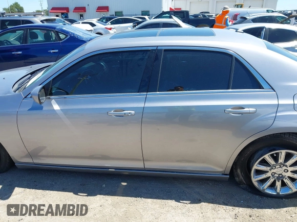 2014 Chrysler 300 with VIN 2C3CCAAG8EH264595, listed as a IAAI auction lot 42076996 with 101,659 mi miles and . Bid and sale history available at DreamBid. Image 15.