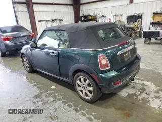 2010 MINI Convertible S z VIN WMWMS3C54ATY51980, wystawiony jako Copart lot #56589265 z przebiegiem 147 136 mil mil oraz Szkoda całkowita • Salvage title. Historia ofert i sprzedaży dostępna na DreamBid. Obrazek 2.