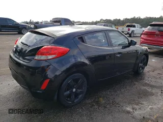 2012 Hyundai Veloster w/Red Int with VIN KMHTC6ADXCU063897, listed as a Copart auction lot 82100474 with 191,493 mi miles and Salvage title. Bid and sale history available at DreamBid. Image 3.