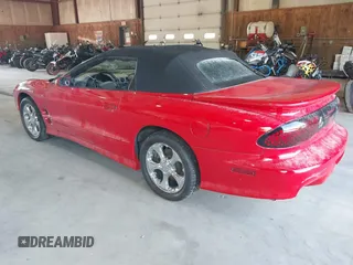 2000 Pontiac Firebird Trans Am with VIN 2G2FV32G7Y2121291, listed as a IAAI auction lot 40095437 with 140,293 mi miles. Bid and sale history available at carsss.com. Image 3.