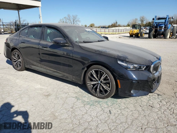 2024 BMW 5 Series 540i xDrive with VIN WBA63FJ00RCS64587, listed as a Copart auction lot 79386694 with 0 mi miles and Salvage Title. Bid and sale history available at carsss.com. Image 4.