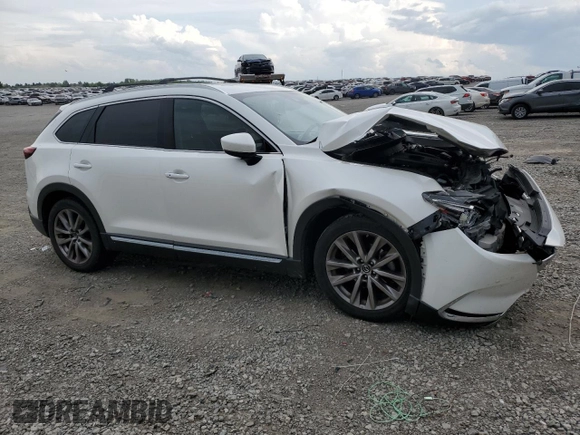 2018 Mazda CX-9 Signature with VIN JM3TCBEY8J0205427, listed as a Copart auction lot 55131585 with 123,812 mi miles and Salvage title. Bid and sale history available at DreamBid. Image 4.
