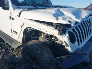 2021 Jeep Wrangler Unlimited Sahara with VIN 1C4HJXEG1MW597905, listed as a IAAI auction lot 41327138 with Not provided miles and . Bid and sale history available at DreamBid. Image 21.
