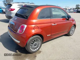 2012 FIAT 500 Gucci with VIN 3C3CFFER8CT370548, listed as a IAAI auction lot 42028846 with 74,091 mi miles. Bid and sale history available at carsss.com. Image 4.