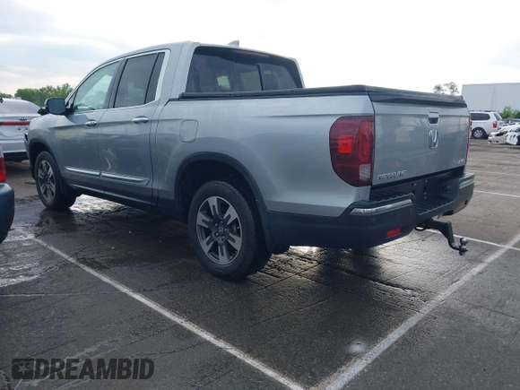2019 Honda Ridgeline RTL-E with VIN 5FPYK3F72KB026100, listed as a IAAI auction lot 42205910 with 78,359 mi miles and . Bid and sale history available at DreamBid. Image 3.