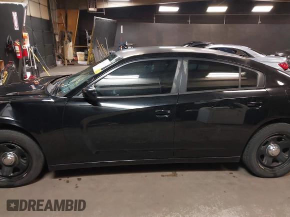 2012 Dodge Charger Police with VIN 2C3CDXAT6CH288100, listed as a IAAI auction lot 41982139 with 90,112 mi miles. Bid and sale history available at carsss.com. Image 14.